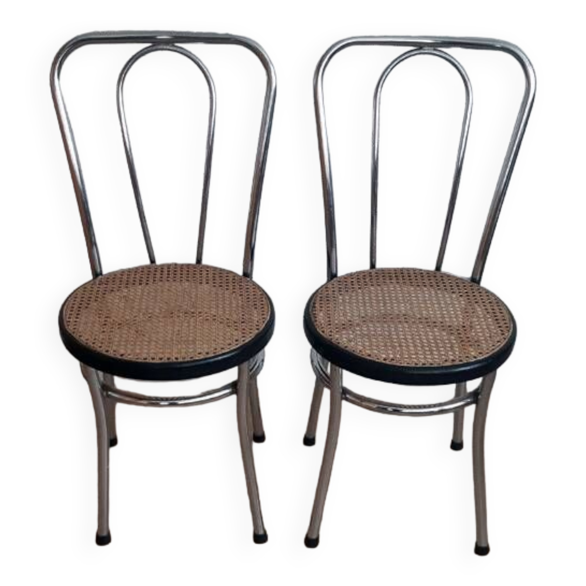 Pair of chrome and cane bistro chairs from the 70s.