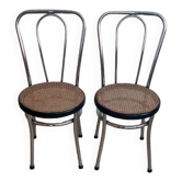 Pair of chrome and cane bistro chairs from the 70s.
