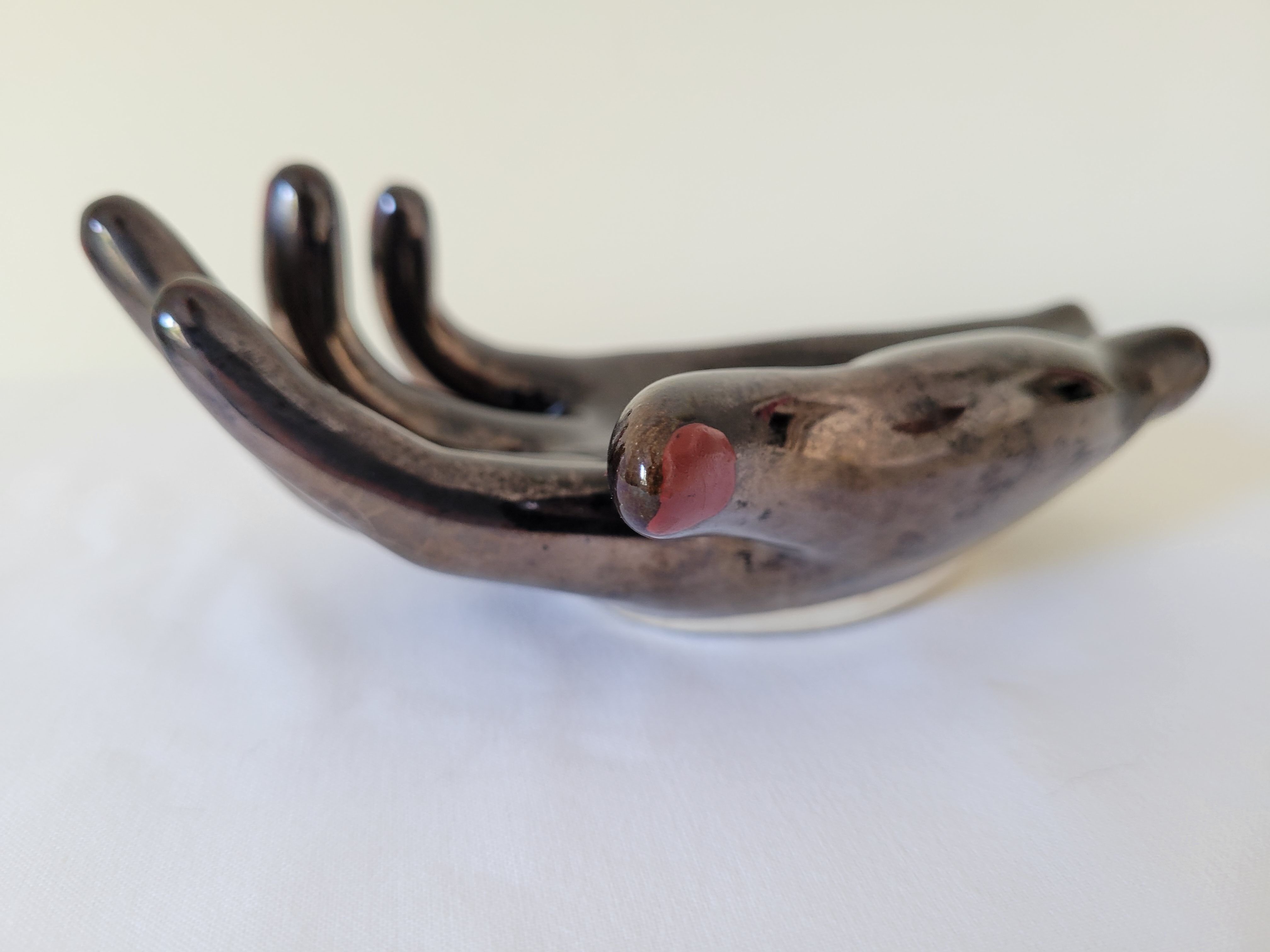 Empty pockets in the shape of a hand