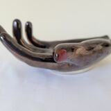 Empty pockets in the shape of a hand