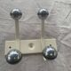 Industrial wall coat rack two hooks in white lacquered metal and vintage silver 1970