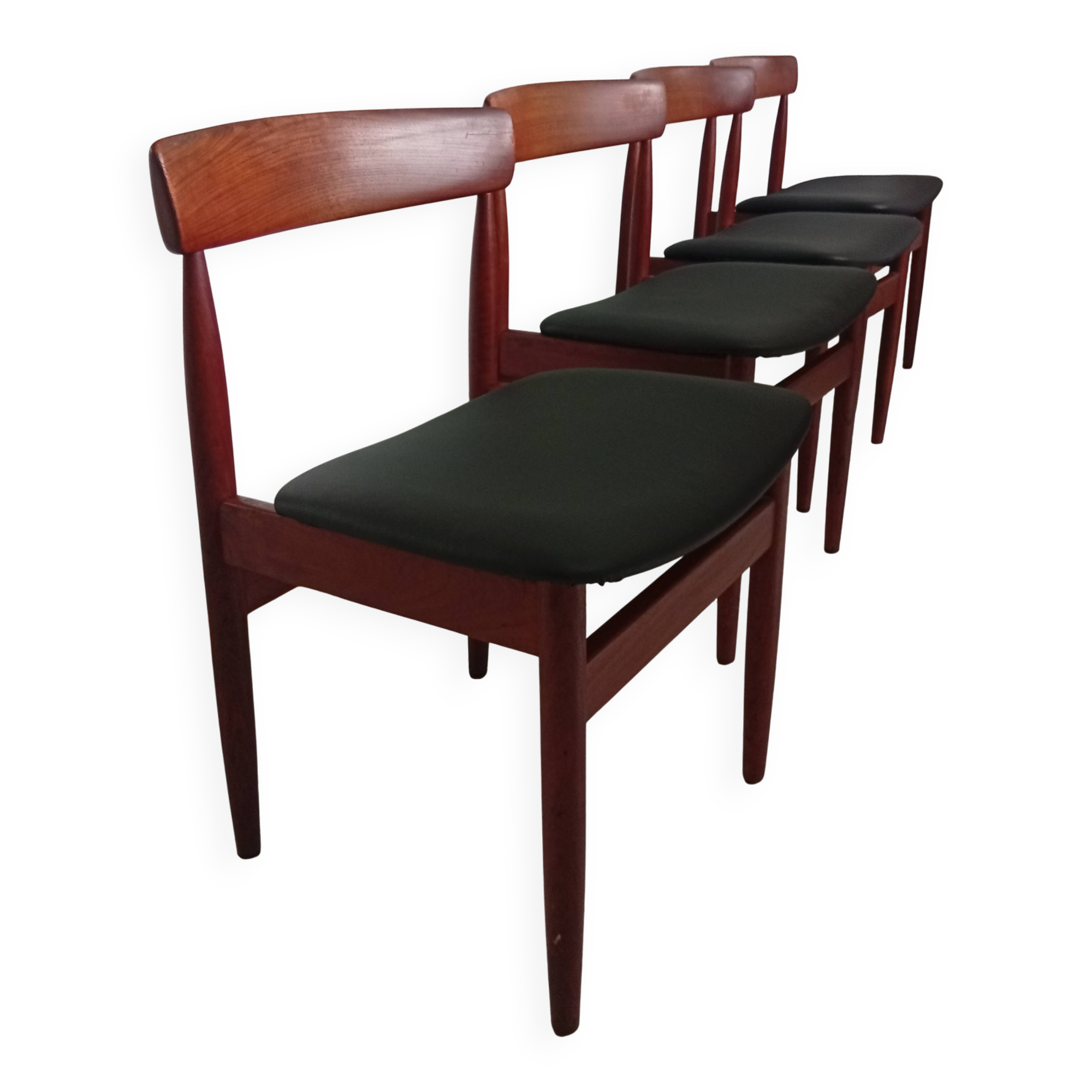 Four Danish mid-century teak armchairs.