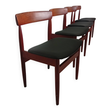 Four Danish mid-century teak armchairs.