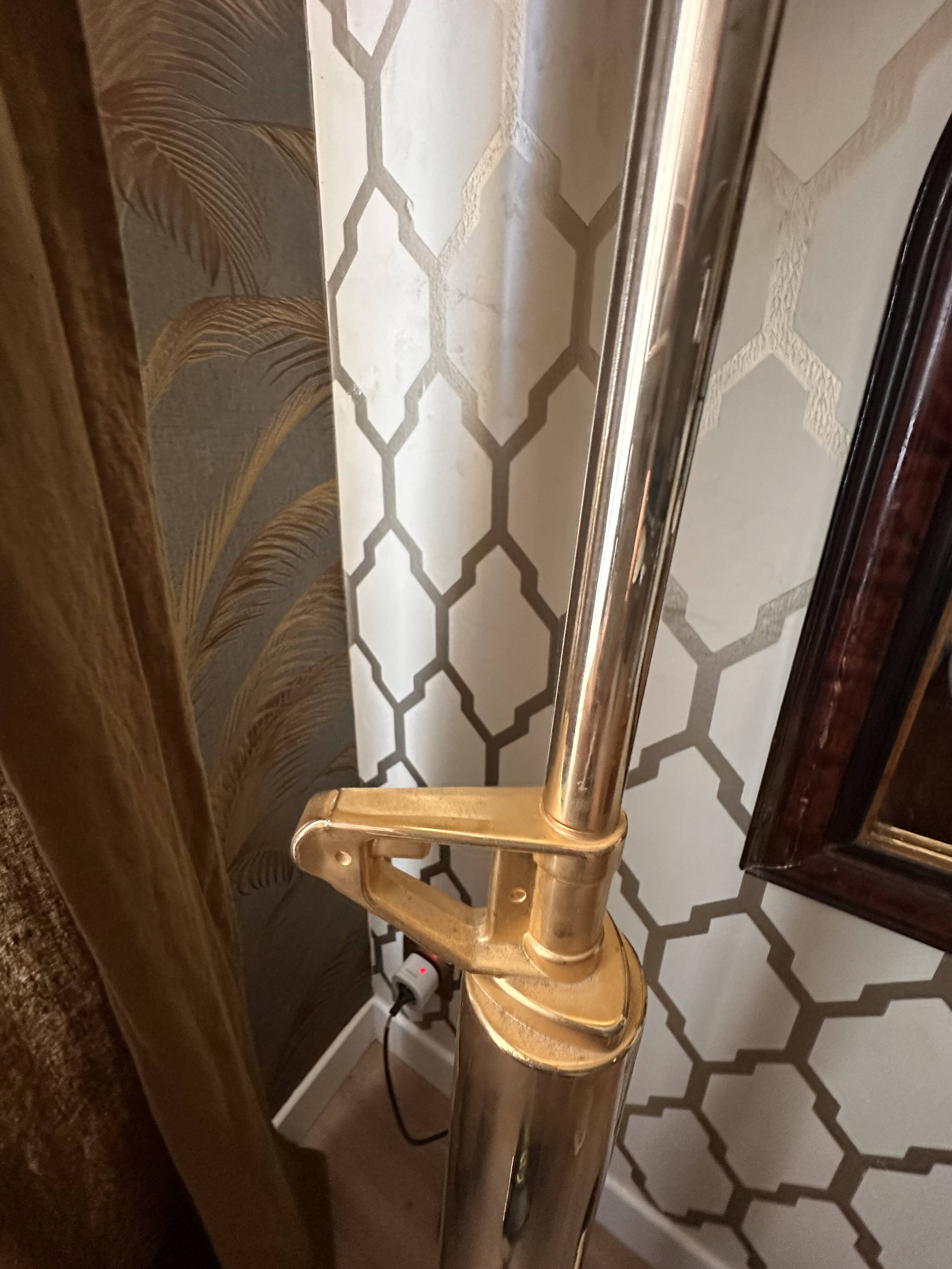 "Lounge Gun" floor lamp by FLOS by Philippe Starck – Gold