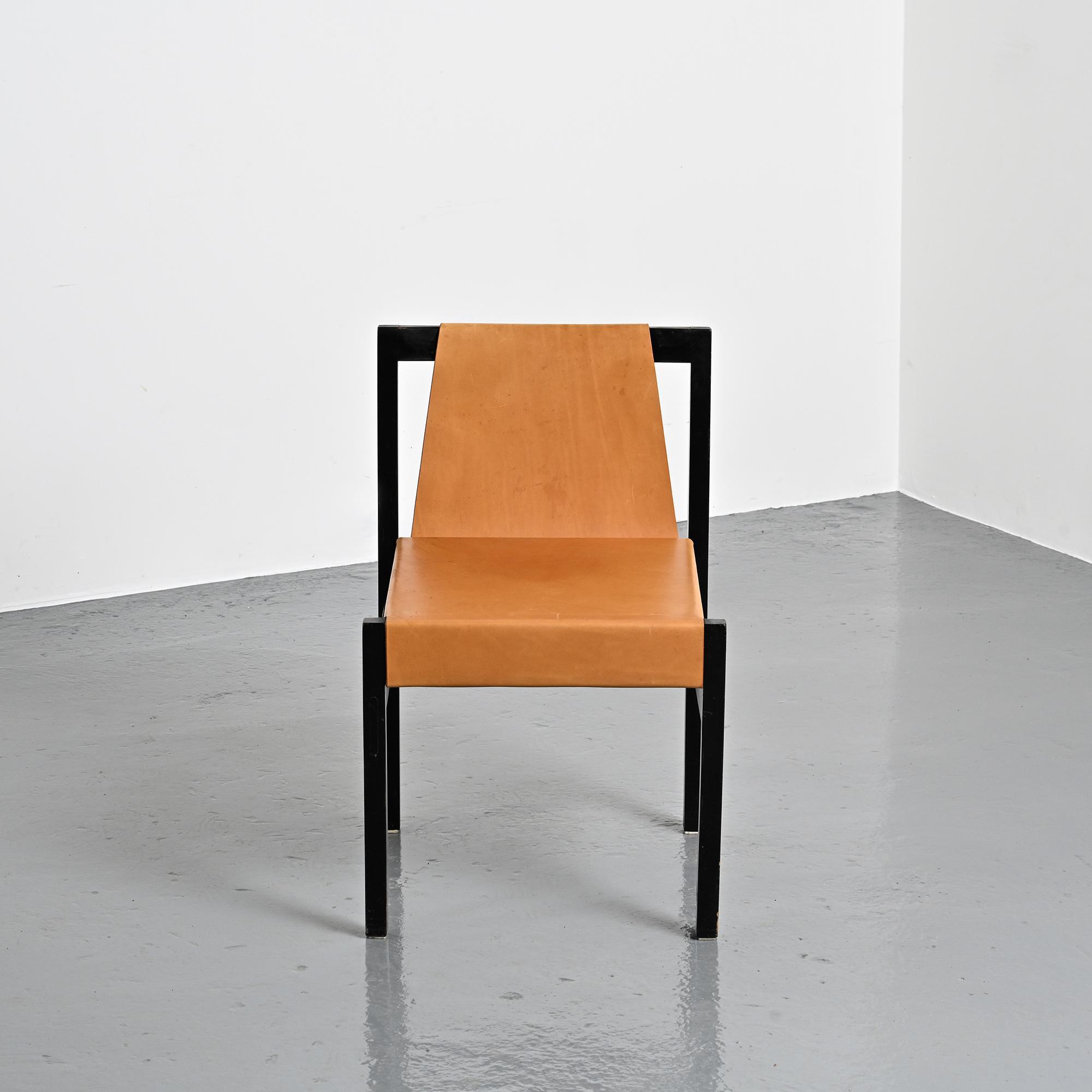 Set of black lacquered wooden chairs with leather, Swiss architect's work, 1980s.