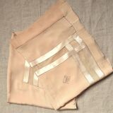 Silk sheet and birthcase, with initial K