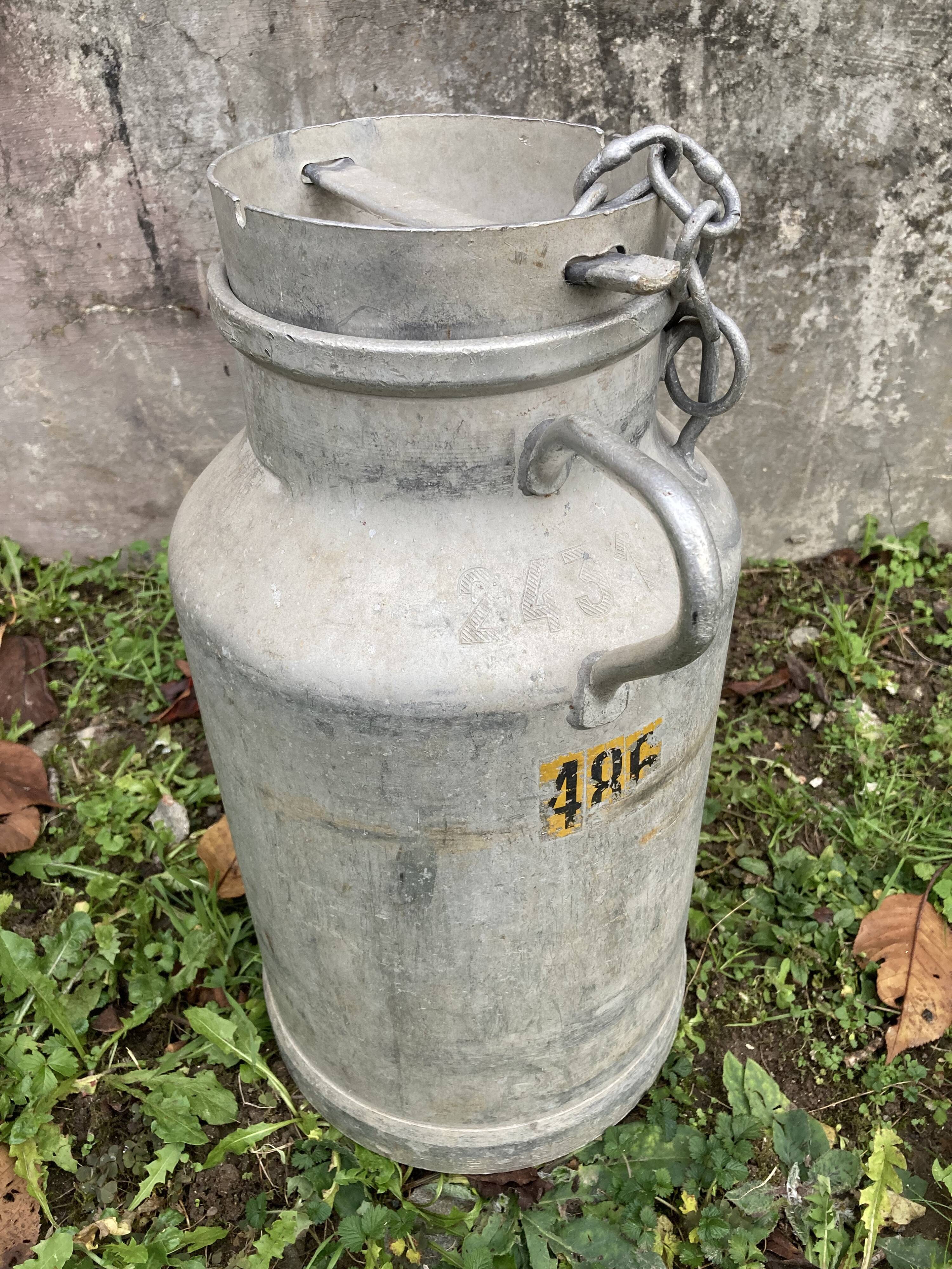 Pair of farm milk jars aluminum cans