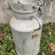 Pair of farm milk jars aluminum cans