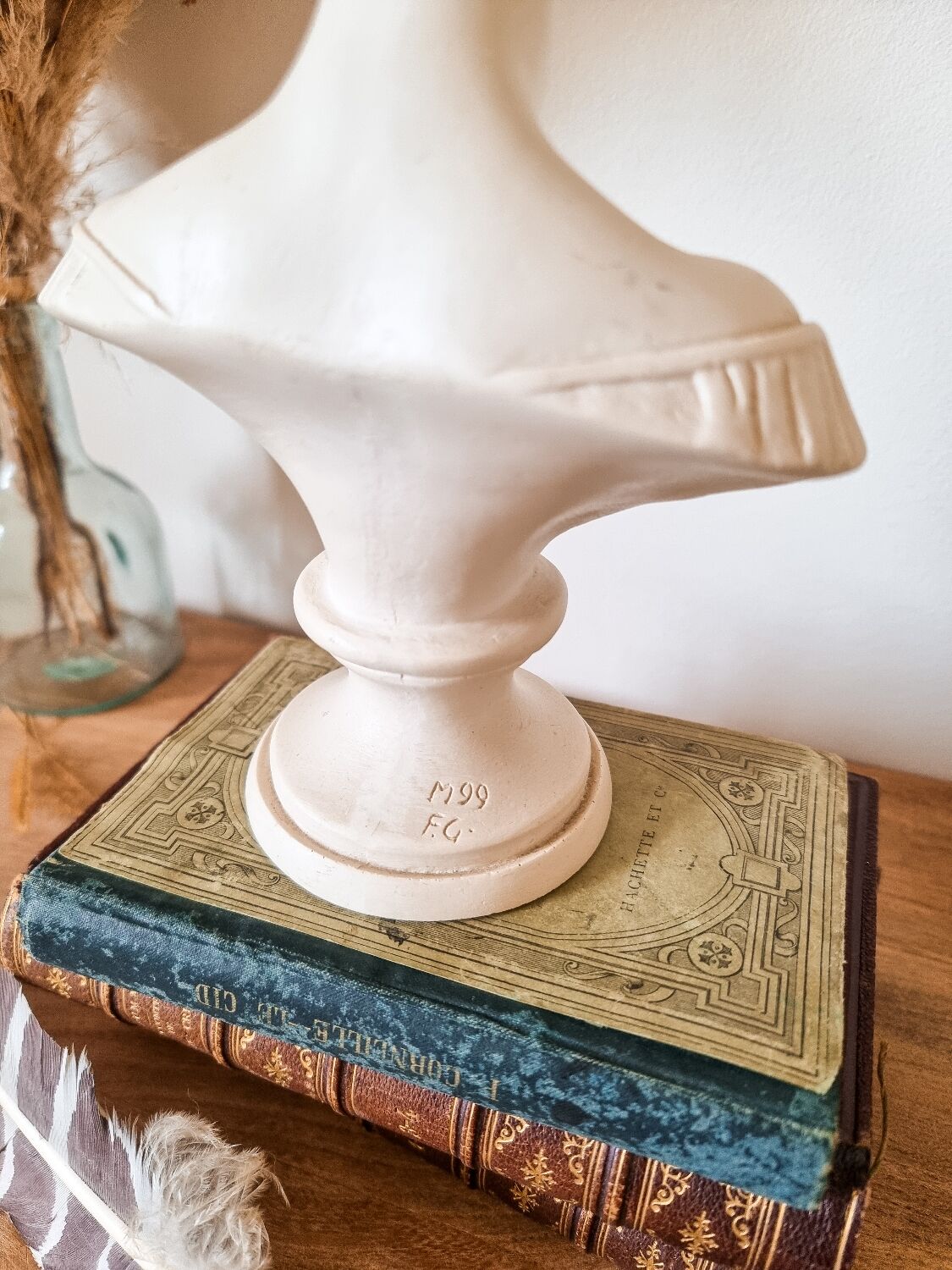 Resin women's bust, signed F.G.