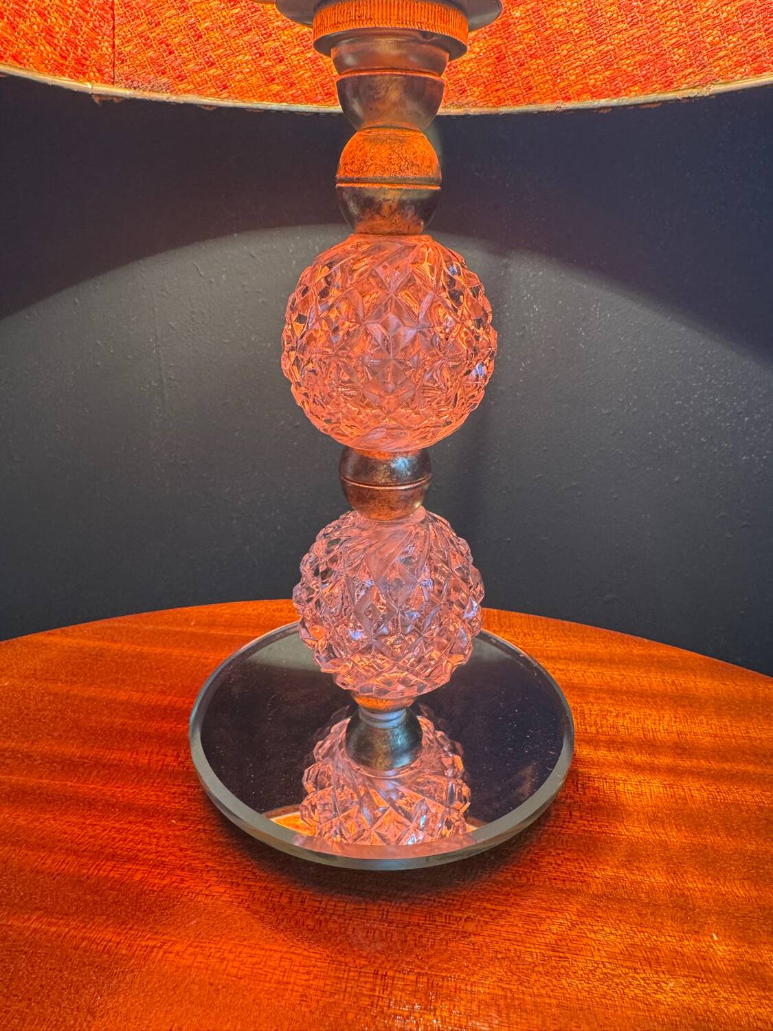Small glass, mirror, and brass lamp from the 1960s.