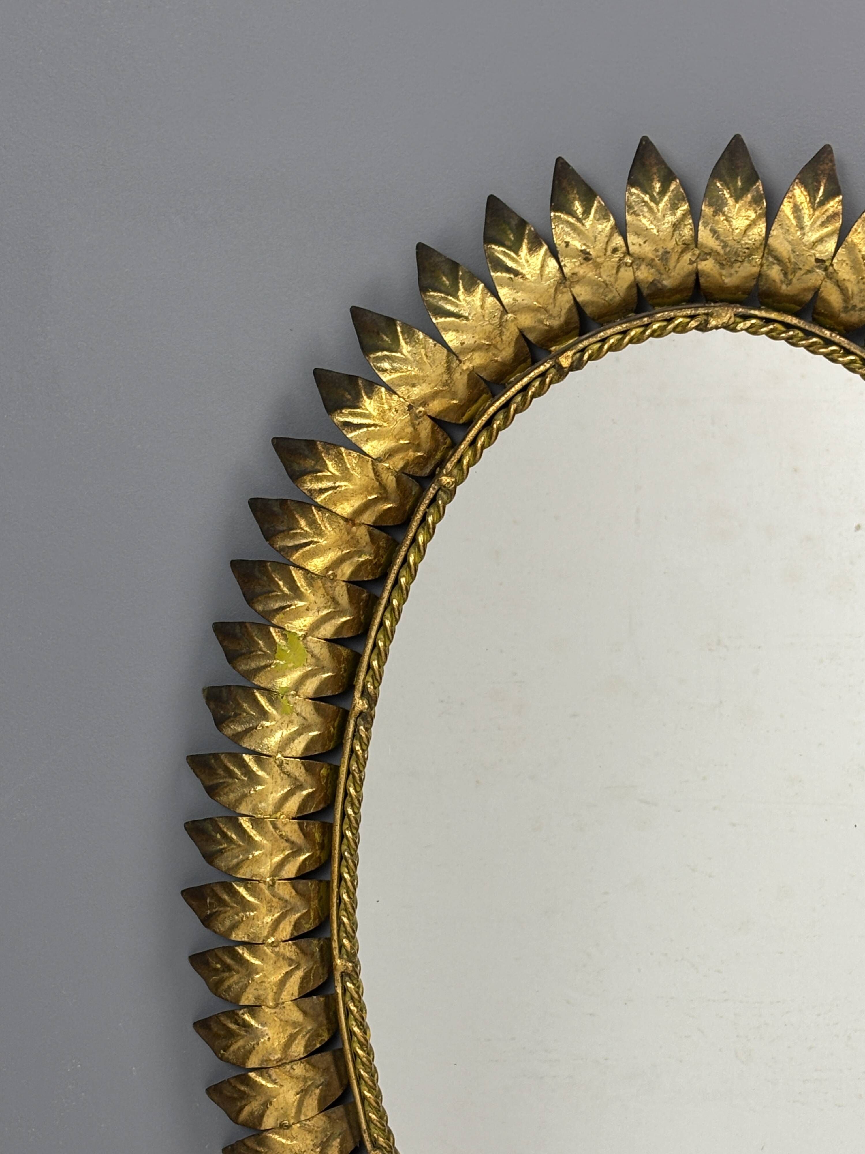 Midcentury bohemian hollywood regency spanish gilt metal sun mirror, 1960s