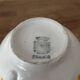 Set of two antique yellow Digoin Sarreguemines cups.