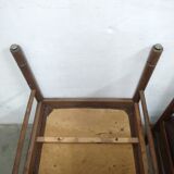 2 chaises en bois de cuir