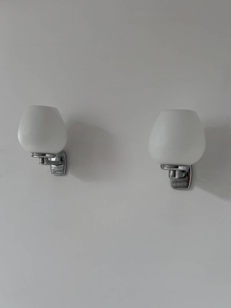 Pair of vintage opaline and chrome metal wall lights, France, 1970.