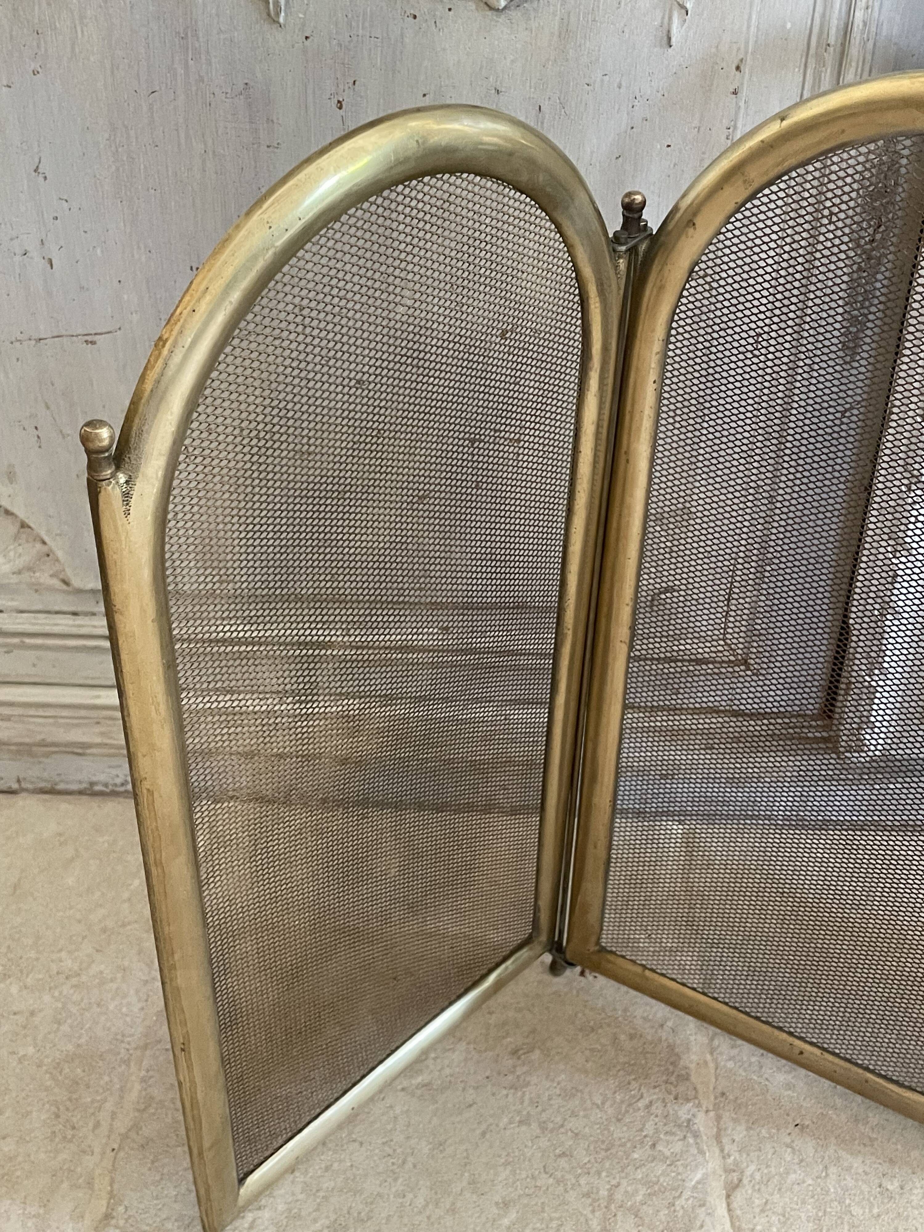 Vintage brass fireplace screen, folding spark guard with 4 panels,