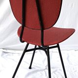 sixties chair with steel tube legs and a skaï seat