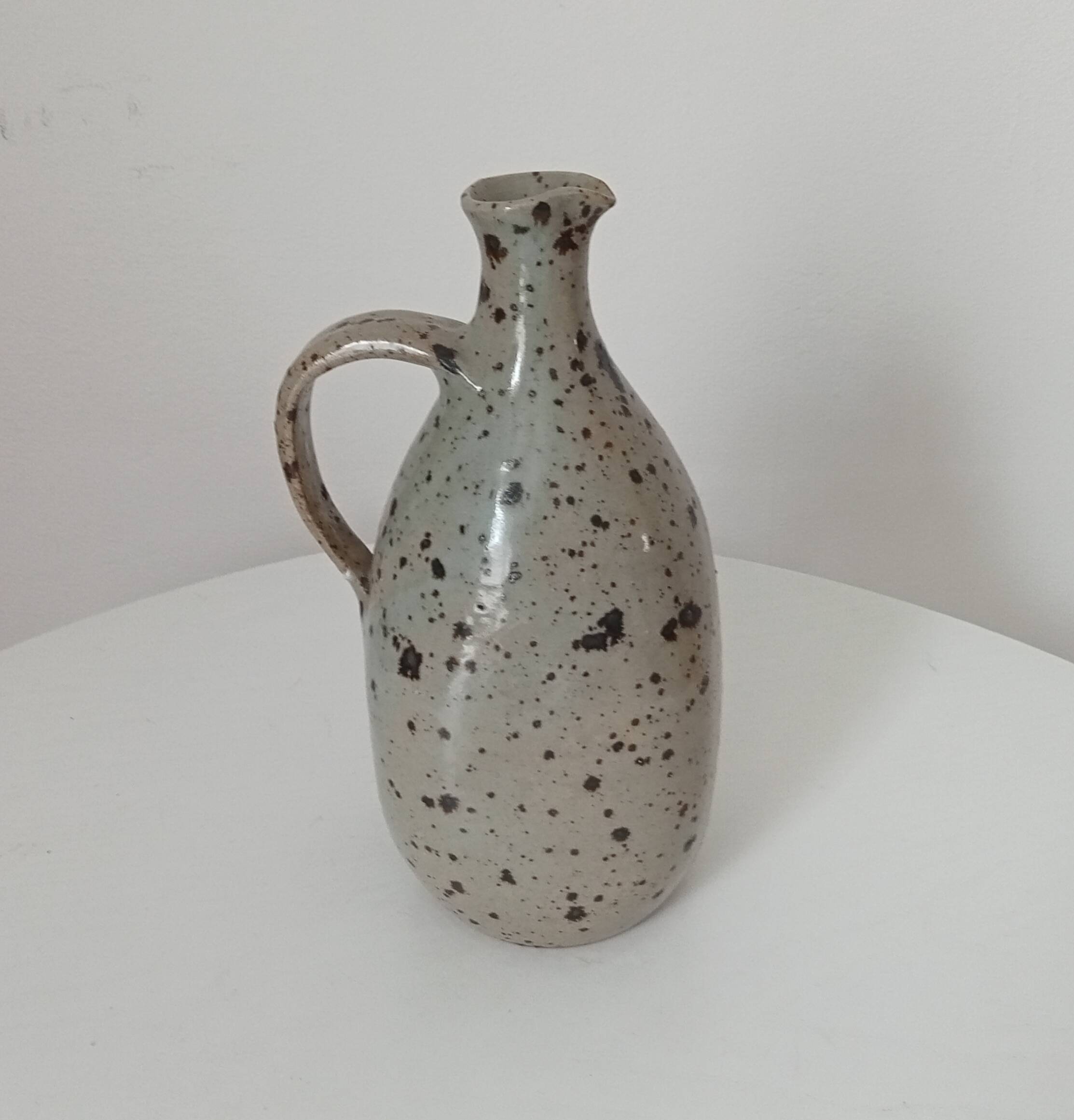 Signed pitcher in vintage speckled stoneware