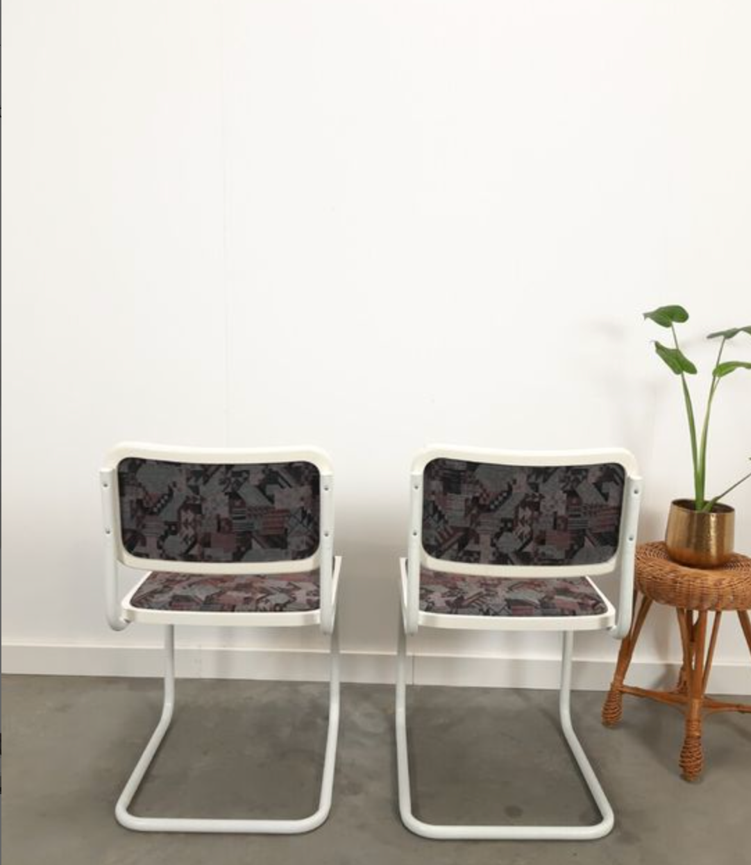 Pair of vintage tubular frame dining chairs