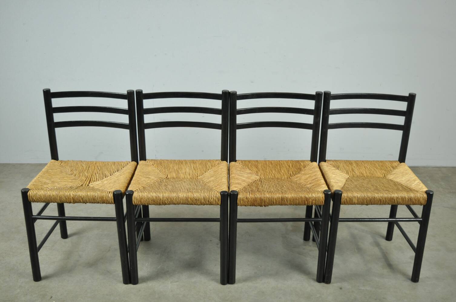 MID-CENTURY modern dining chairs with rush seat, 1960s