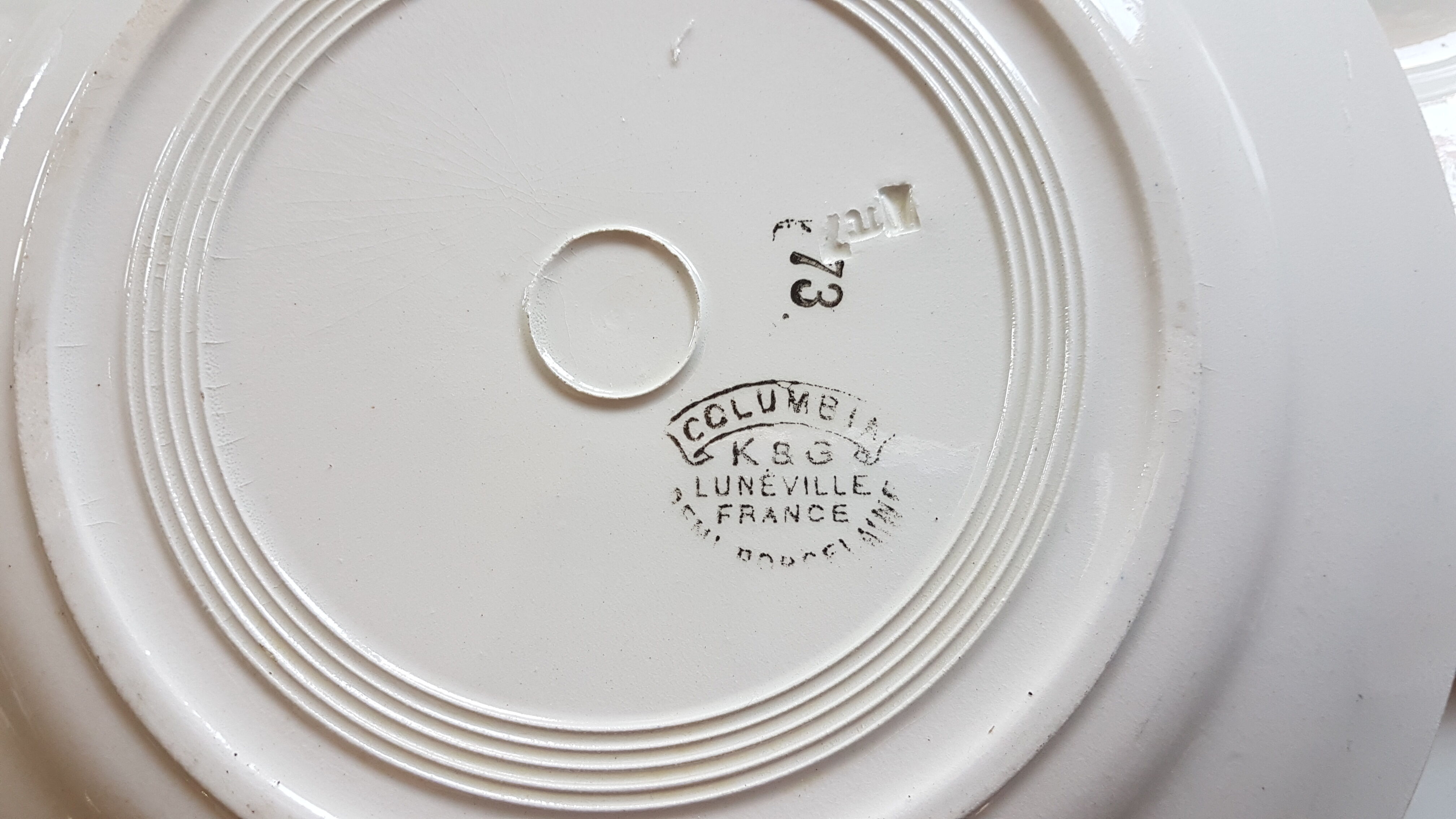 Suite of 4 plates made of Lunéville earthenware