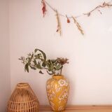 Yellow enamel vase with white flower decoration