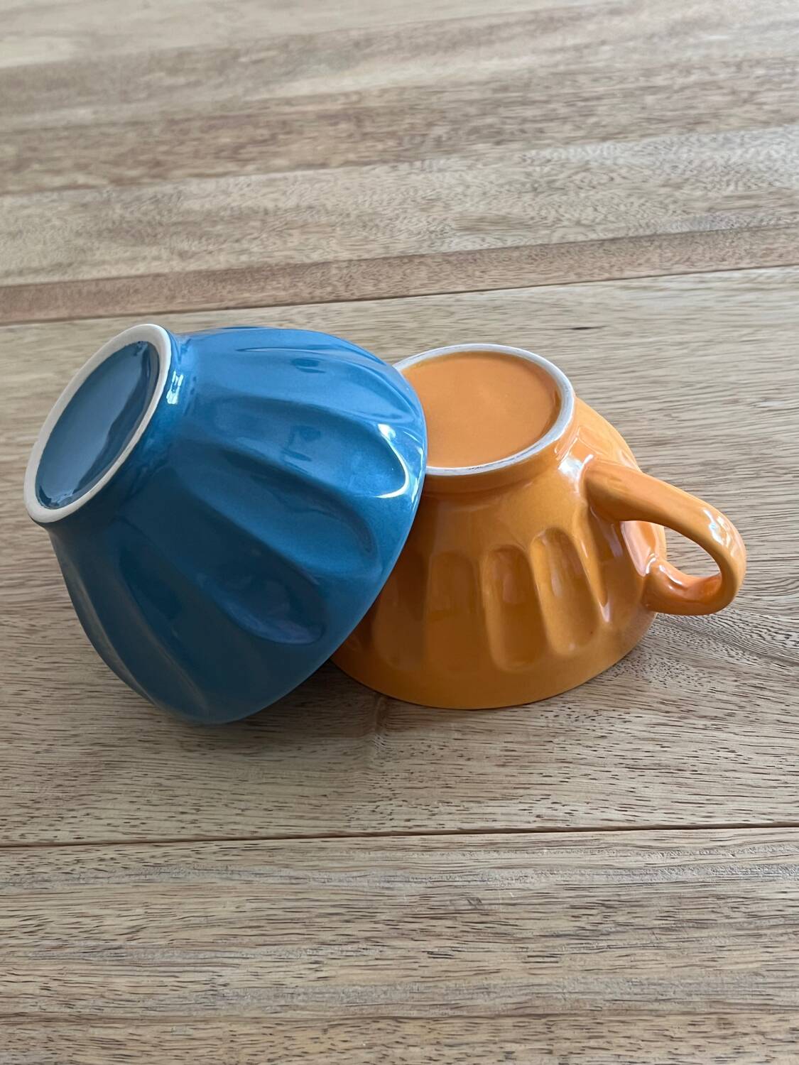 2 colorful faceted bowls