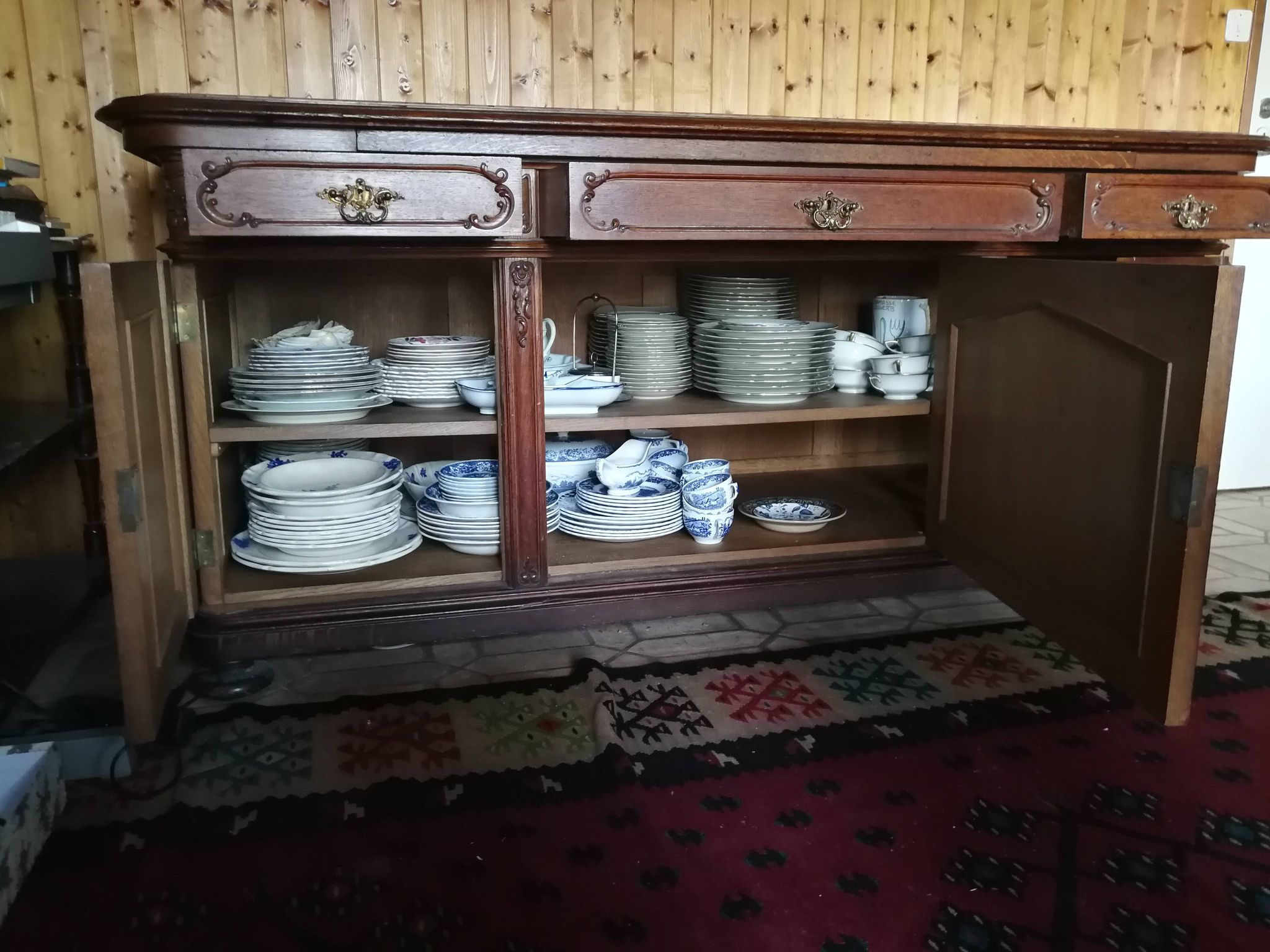 Buffet from the late 19th century with pink-brown marble in Louis XV style.