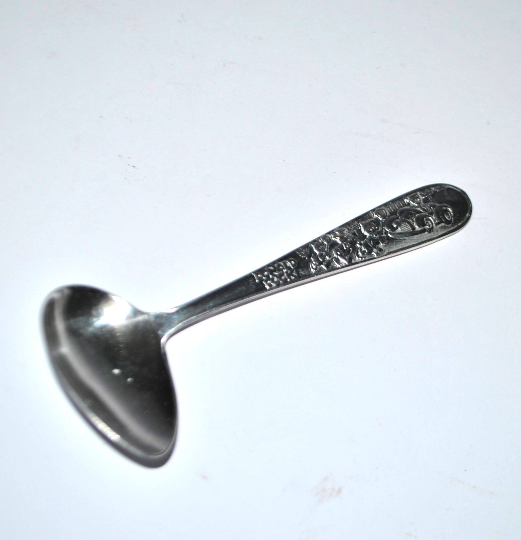 Vintage silver-plated metal porridge spoon, Donald Duck cutlery for children