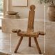 Brutalist chair in solid wood, European handcrafted work from the early 20th century.