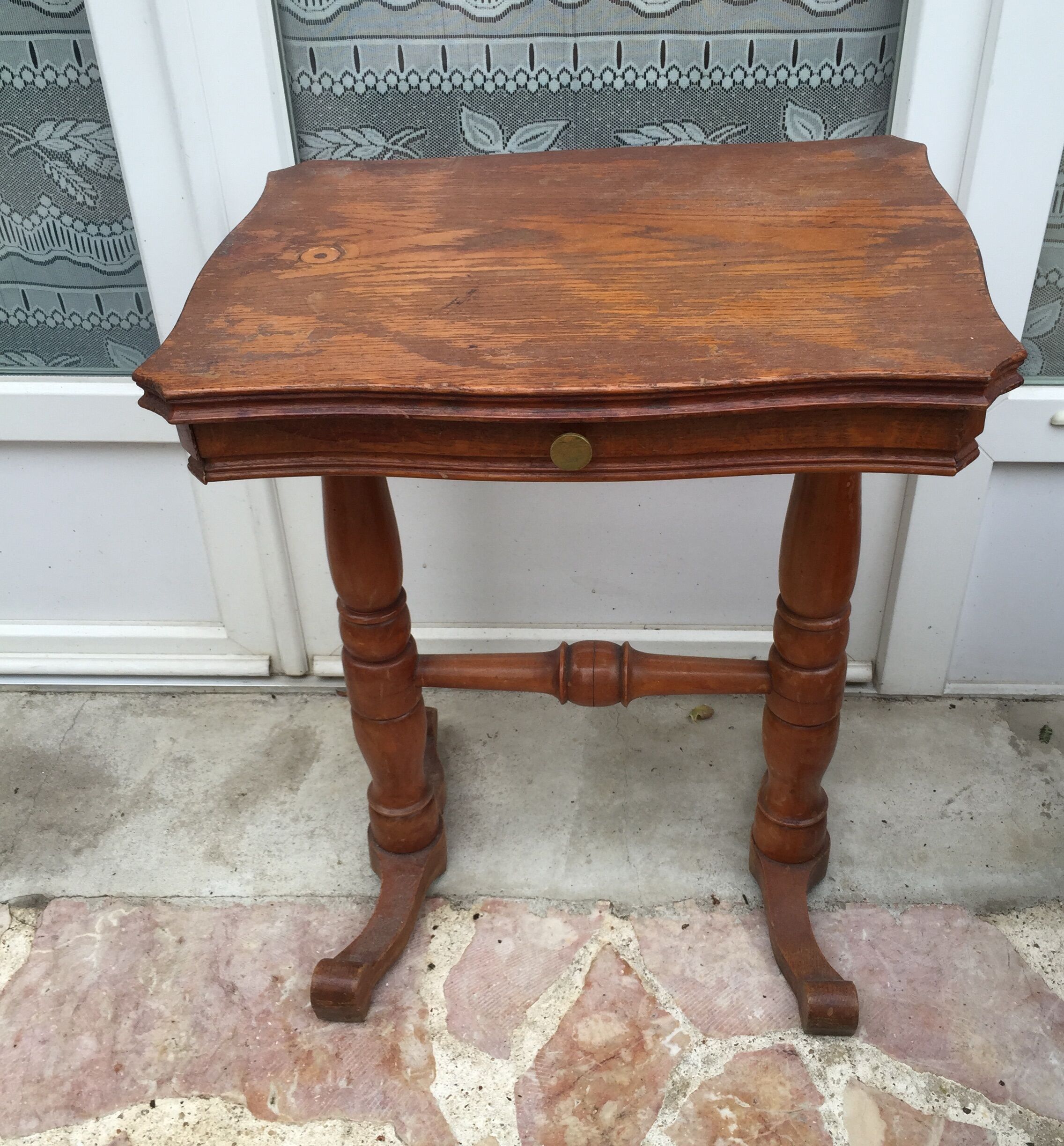 Old wooden sewing worker