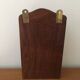 Key box in wood and brass and central motif representing a sailor's anchor