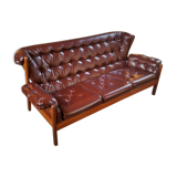 Scandinavian couch in the 60s in teak and skai