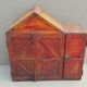 Old atypical metal workshop furniture with its original red patina