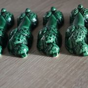 12 green earthenware knife rests