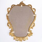 Baroque mirror in golden resin