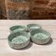 Four spotted green ramekins