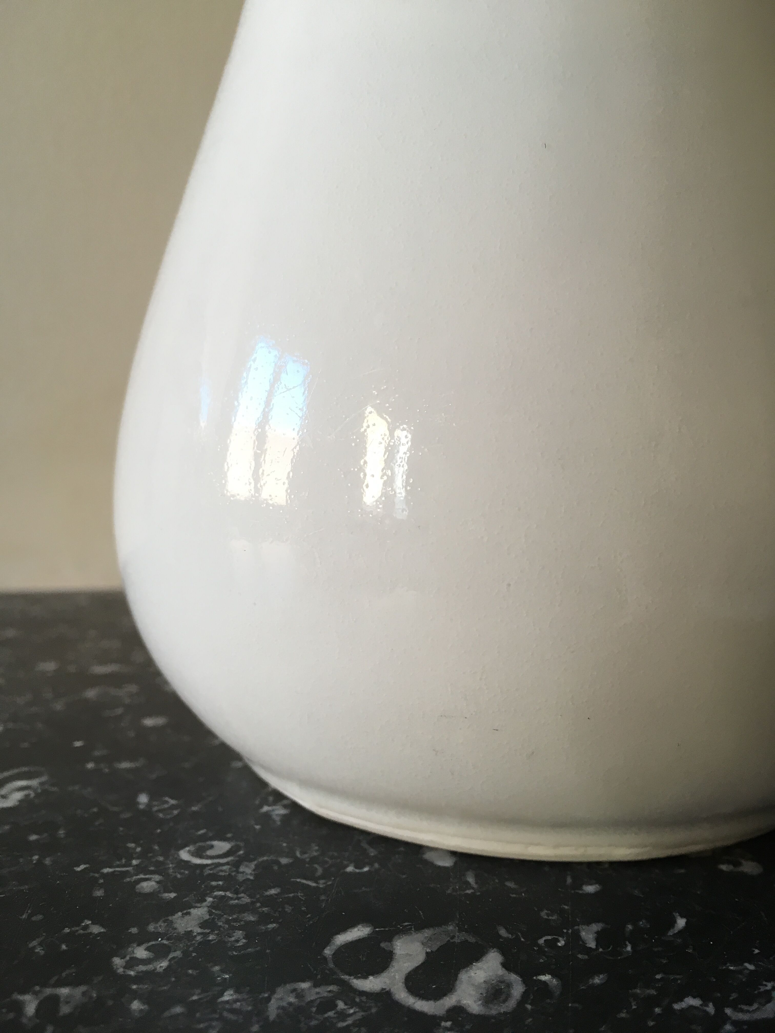 Broc in white fire porcelain with large spout