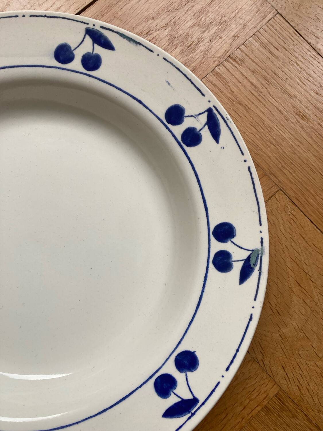 Fruit bowl decorated with blue cherries