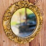Small round antique gold mirror