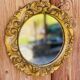 Small round antique gold mirror