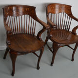 Pair of English Edwardian Oak Spindle Back Captains Office Desk Chairs