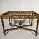 Middle wooden table with green-golden patina Louis XVI style, nineteenth century.