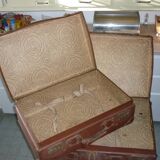 Pair of red suitcases from the 1950s