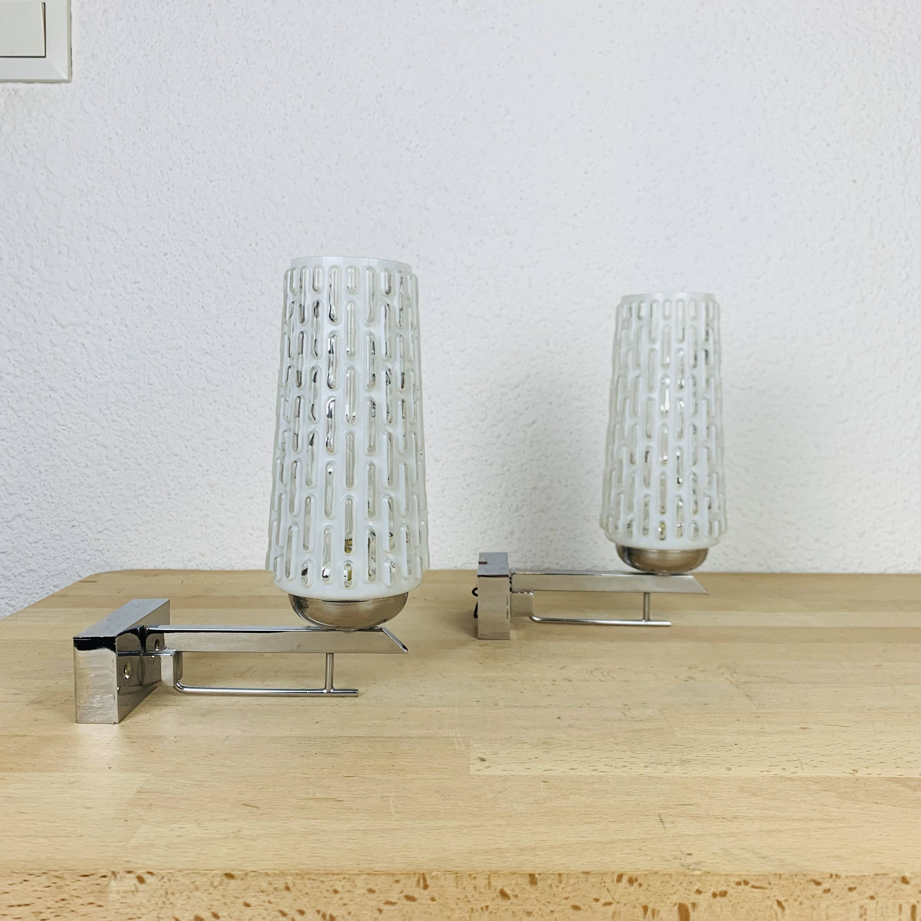Pair of chrome metal wall lights and opaline tulips from the 70s