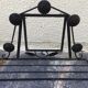 Wrought iron coat rack.