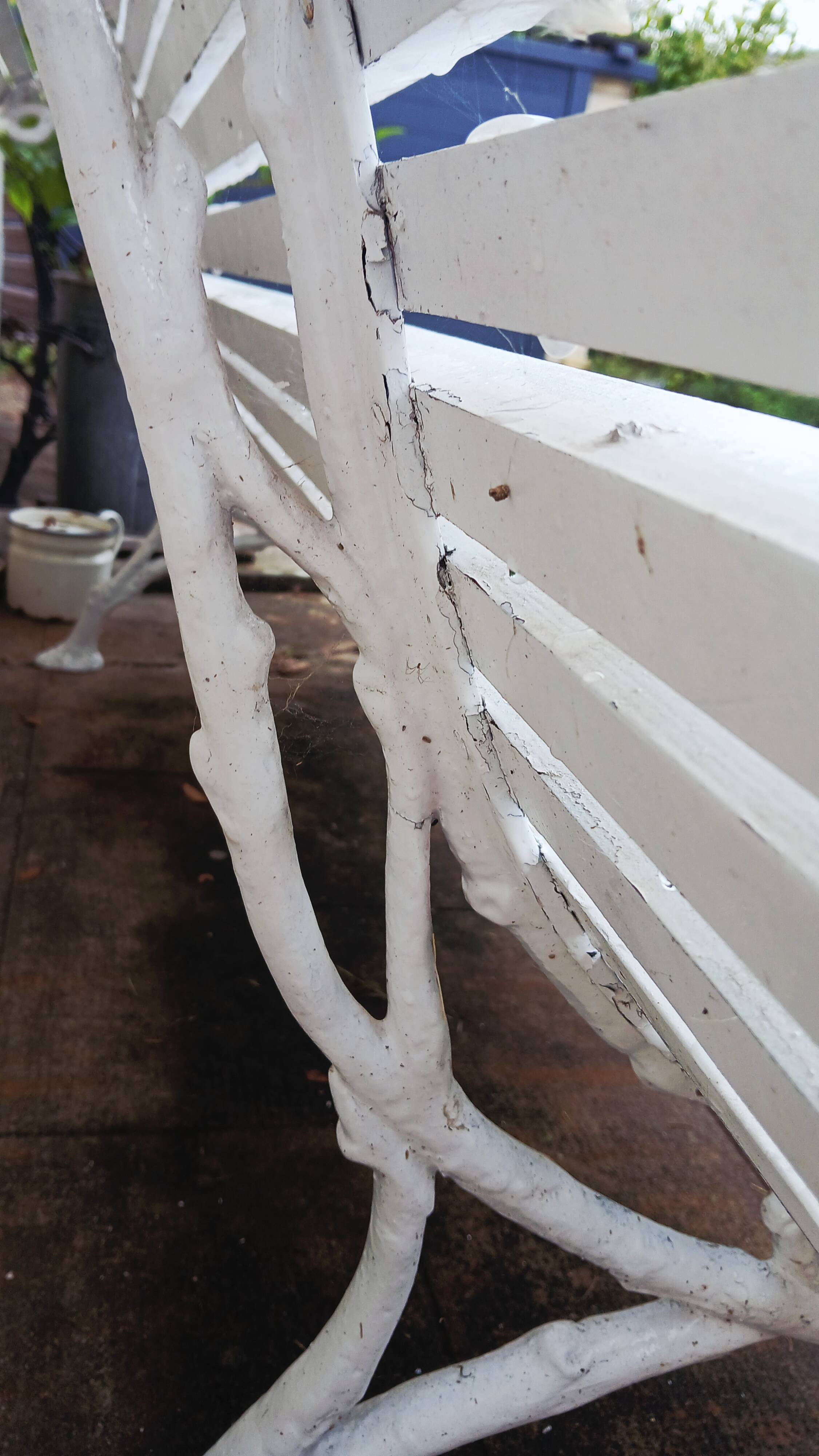 Cast iron and wooden slat garden bench from the early 20th century