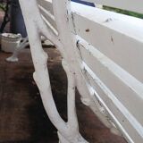 Cast iron and wooden slat garden bench from the early 20th century