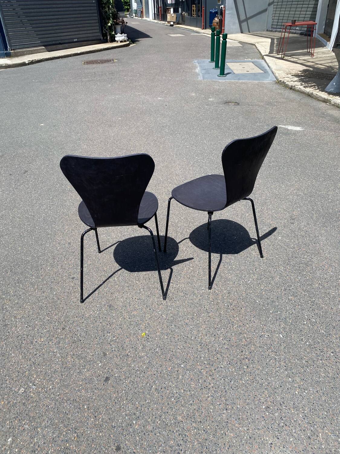 Pairs of wooden chairs