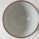 Large light grey speckled earthenware bowl with floral decoration – 1960s–1970s