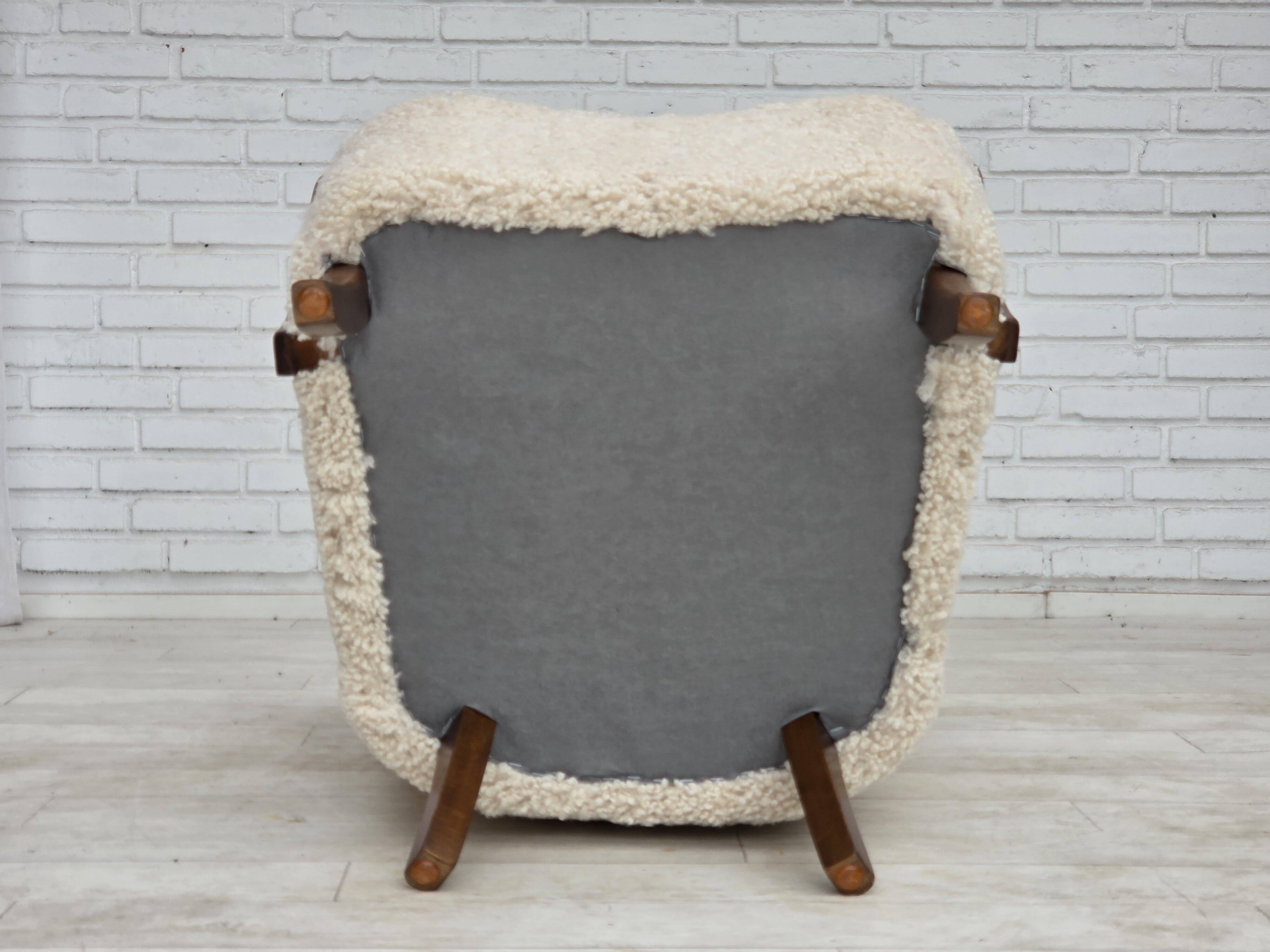 1960s, Danish design by Alfred Christensen, reupholstered, sheepskin.